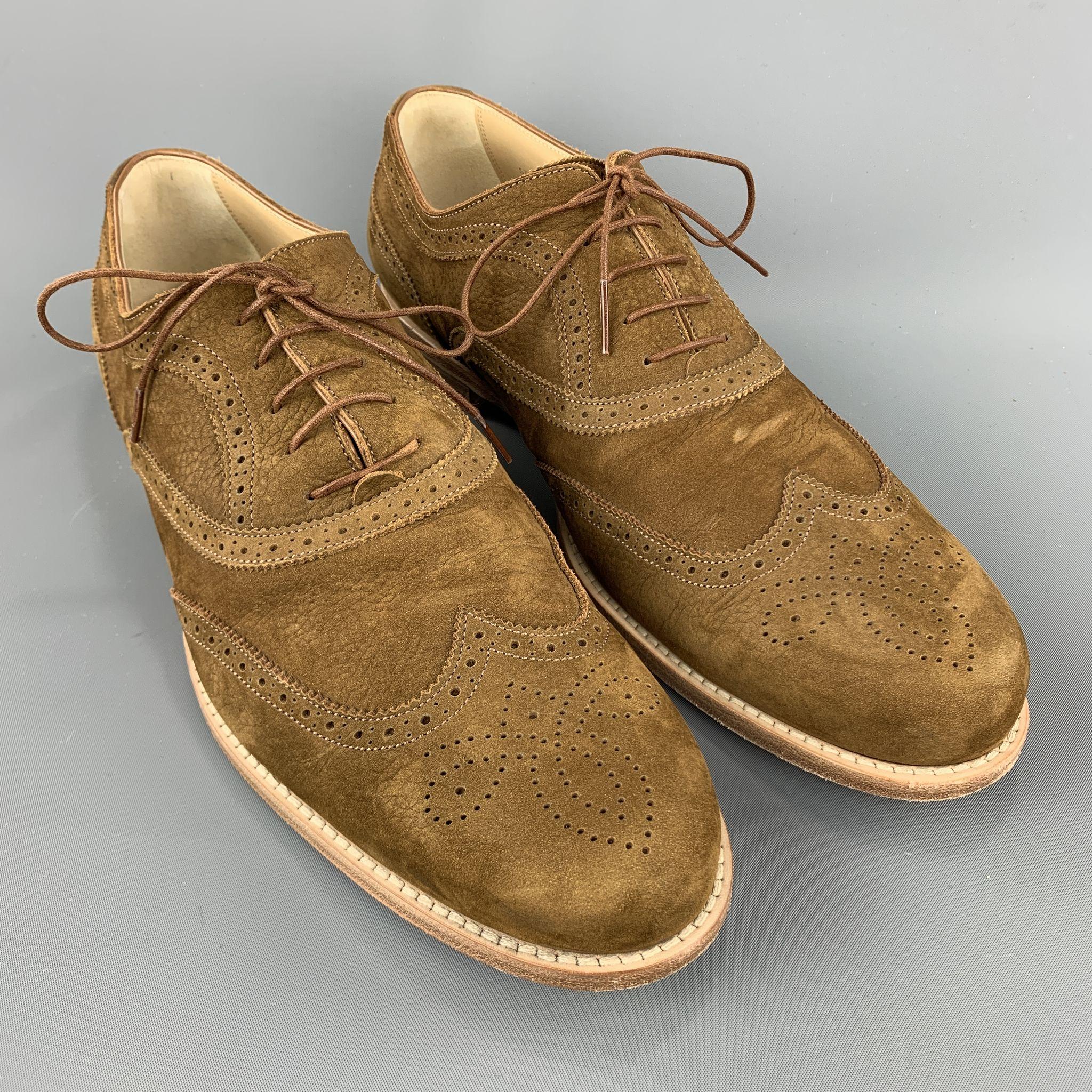 Men's LOUIS VUITTON lace up shoes comes in a brown perforated leather featuring a cap toe and a wooden heel. Made in Italy.

Excellent Pre-Owned Condition.
Marked: 10.5

Outsole: 4.25 in. x 12.5 in. 