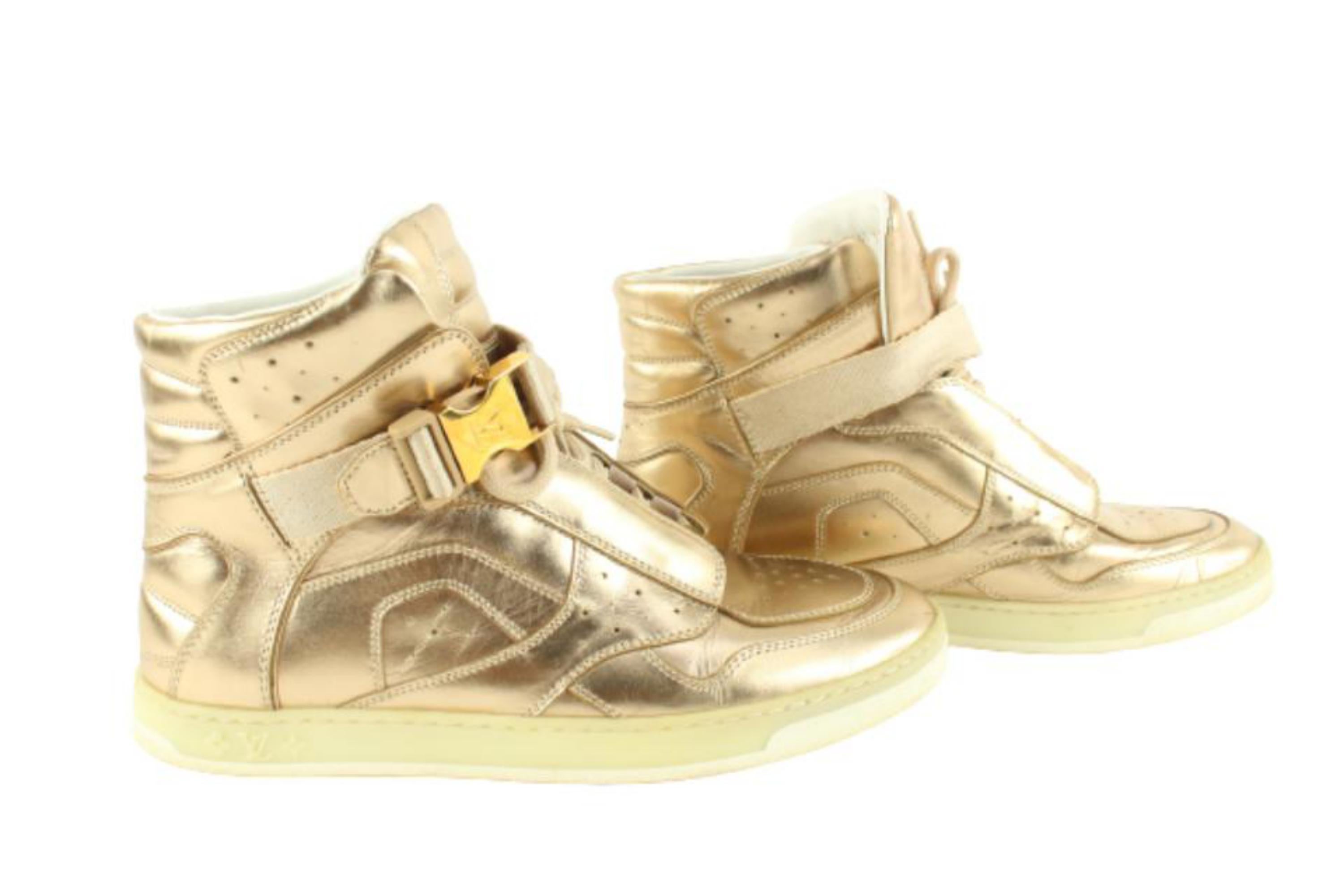 Louis Vuitton Size 36 Gold Metallic High Top Sneaker 1223lv15
Date Code/Serial Number: GO 0143
Made In: Italy
Measurements: Length:  10