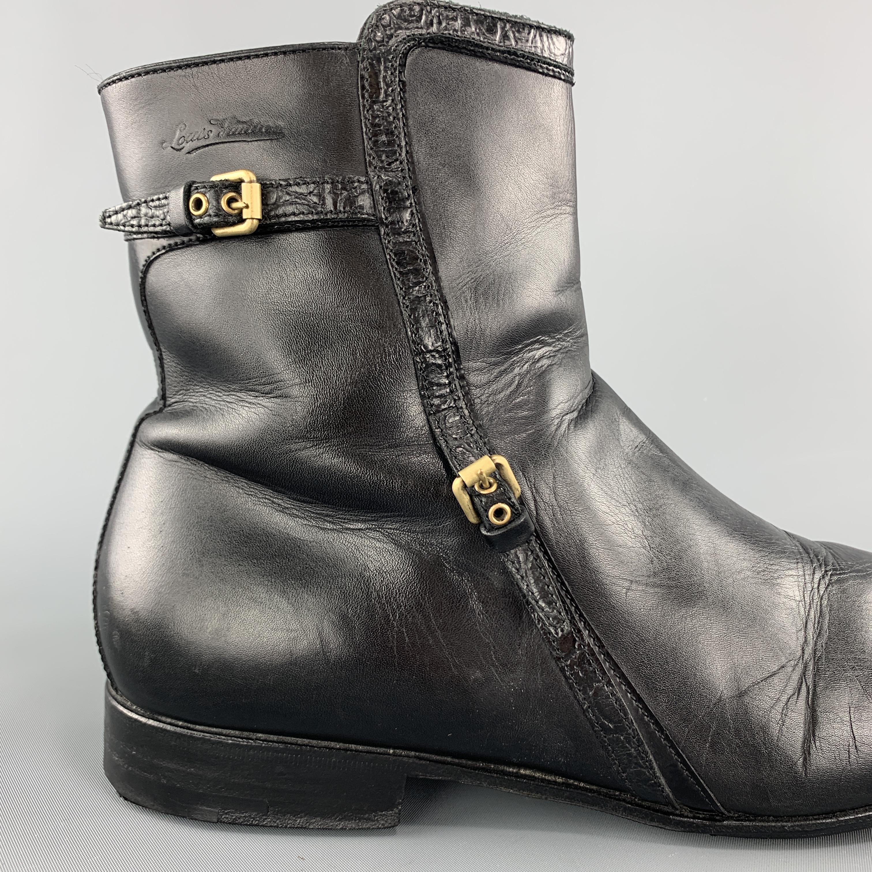 LOUIS VUITTON zip ankle boots come in smooth black leather with a squared off toe, embossed logo, and crocodile embossed patent leather piping with gold tone buckled belt details. Wear on toes. Made in Italy.

Good Pre-Owned Condition.
Marked: UK