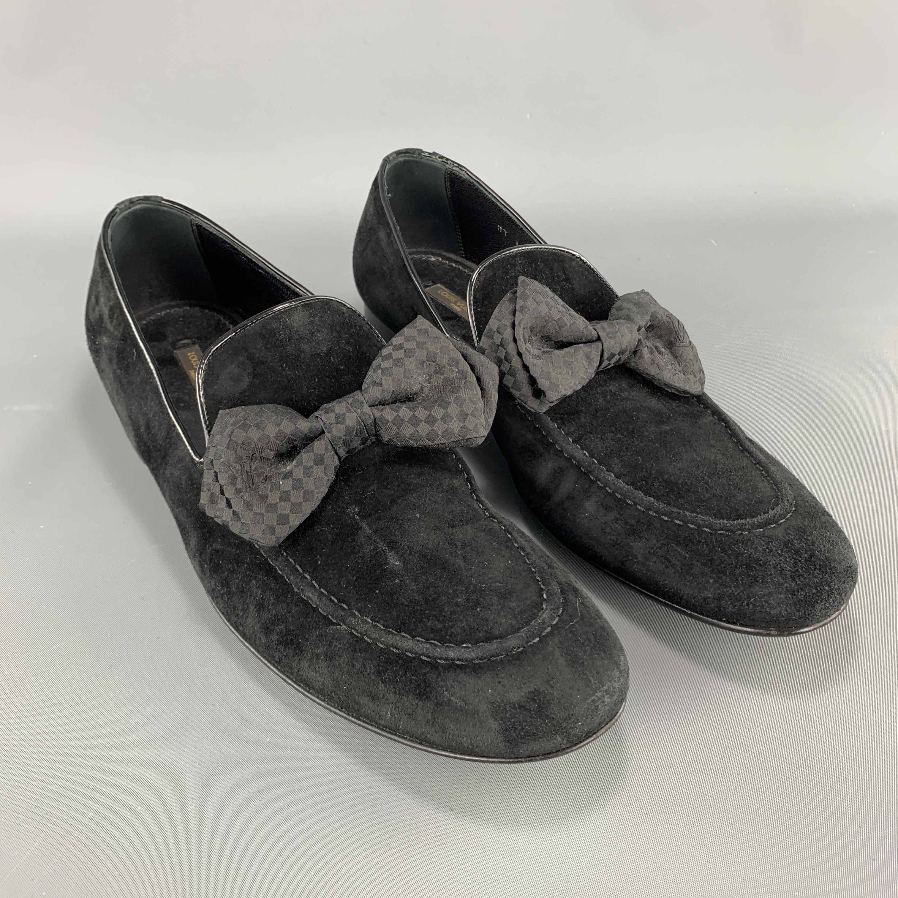 LOUIS VUITTON dress loafers come in black suede with a checkered bowtie detail. Wear throughout. As-is. Made in Italy.

Good Pre-Owned Condition.
Marked: UK 8

Outsole: 11.75 x 3.75 in.