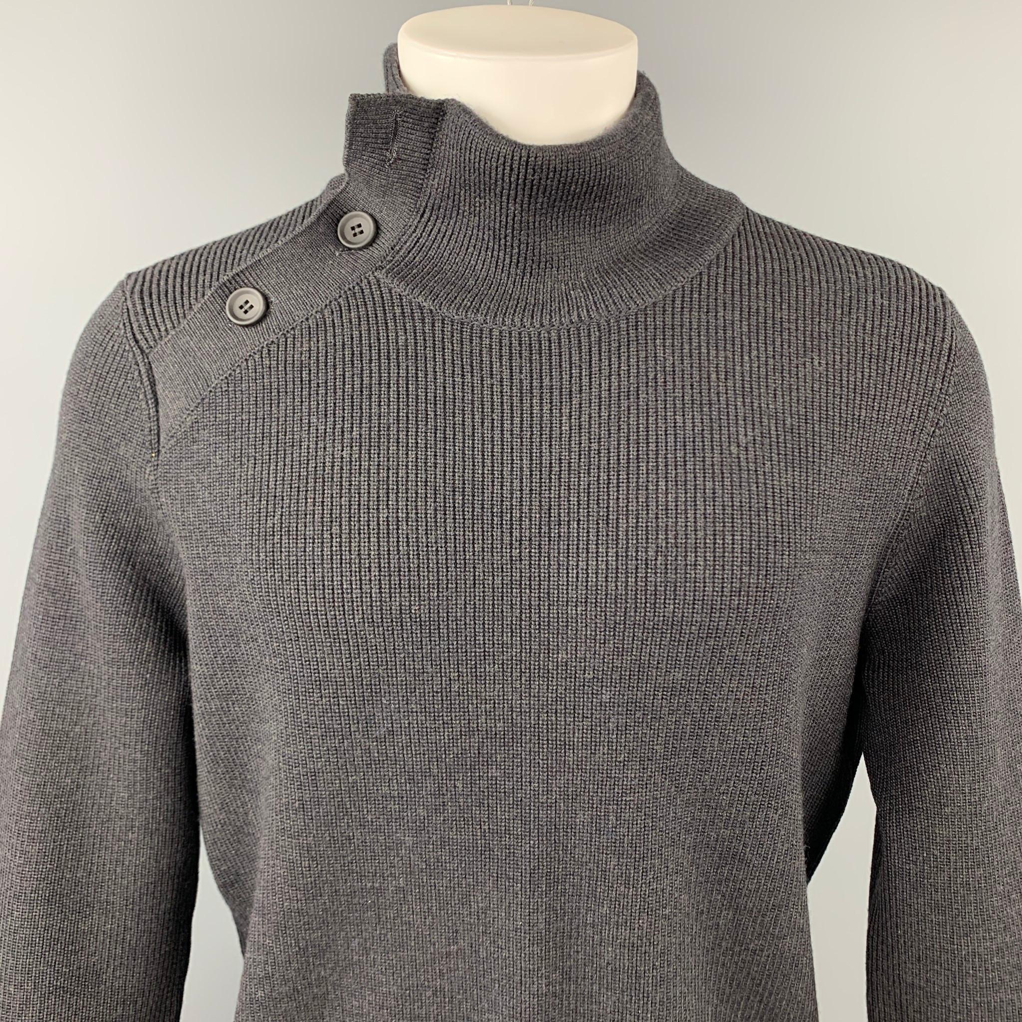 LOUIS VUITTON sweater comes in a charcoal ribbed knit woo featuring a high collar and a side button closure. Made in Italy.

Excellent Pre-Owned Condition.
Marked: L

Measurements:

Shoulder: 18.5 in. 
Chest: 44 in. 
Sleeve: 28 in. 
Length: 28 in. 
