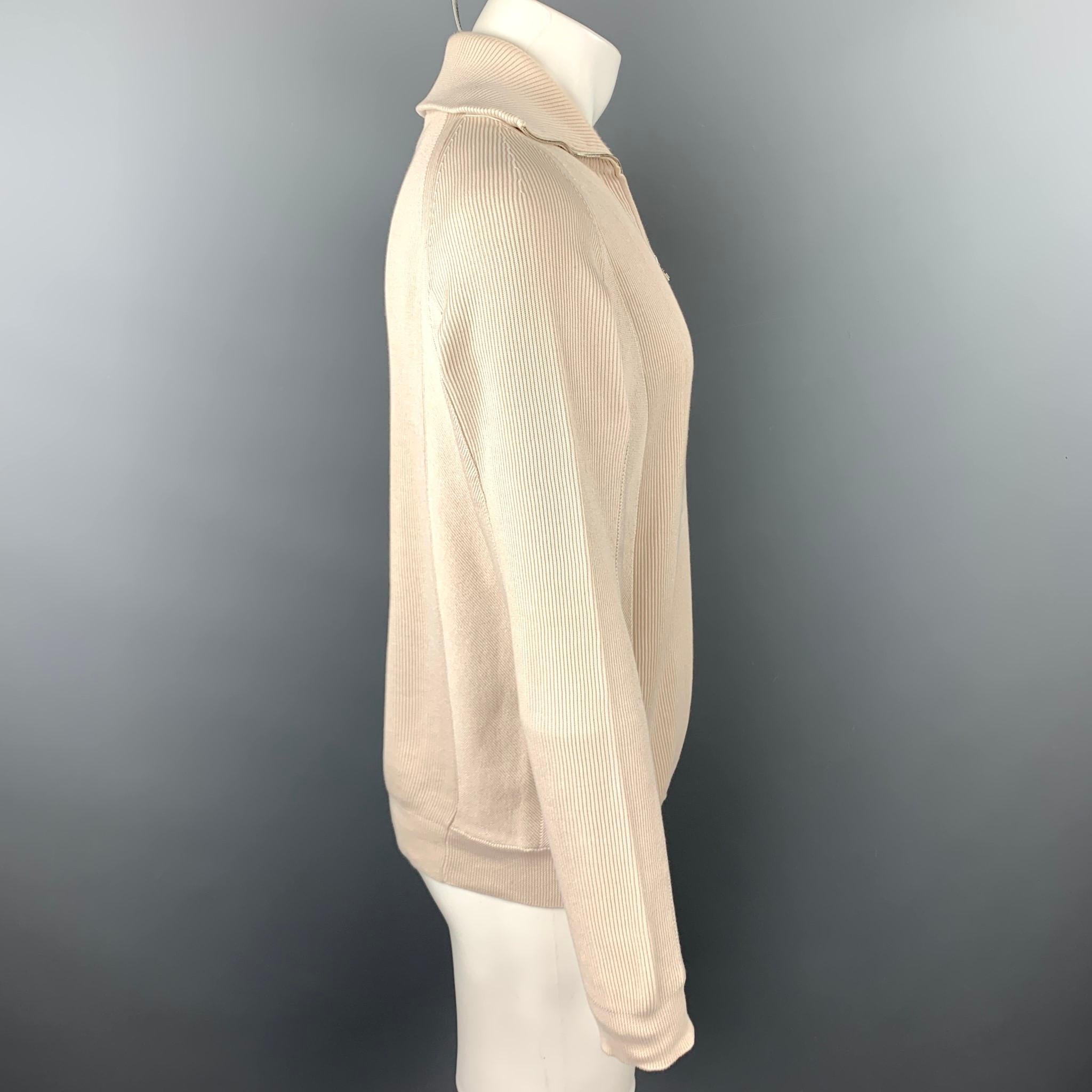 LOUIS VUITTON sweater comes in a beige ribbed knit cotton featuring a high collar and a half zip closure. Made in Italy.

Very Good Pre-Owned Condition.
Marked: M

Measurements:

Shoulder: 17 in.  
Chest: 44 in. 
Sleeve: 28 in. 
Length: 26 in. 
