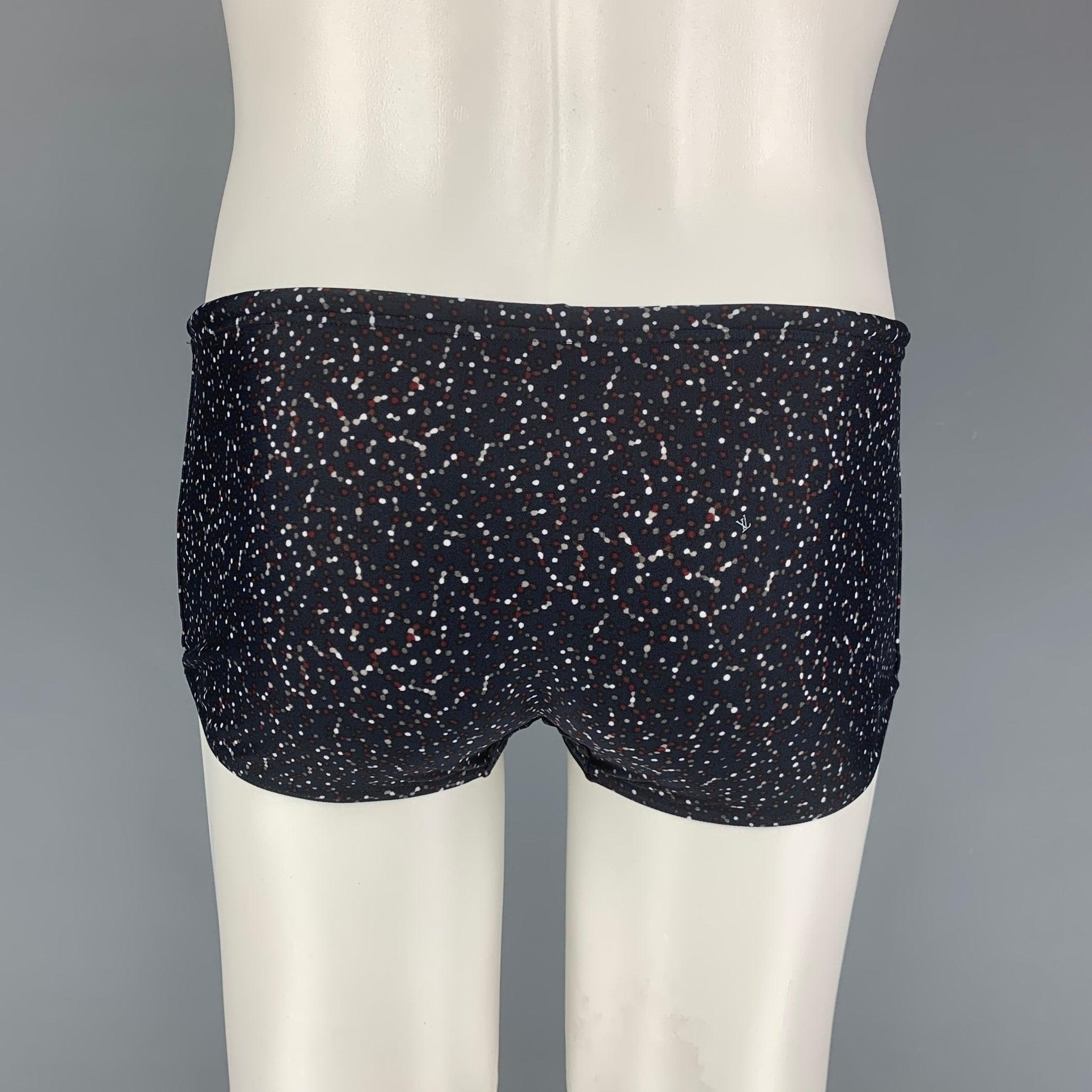 LOUIS VUITTON speedo comes in a black & white print nylon featuring a drawstring detail and gold tone logo hardware. Made in Italy.
Very Good
Pre-Owned Condition. 

Marked:   M  

Measurements: 
  Waist: 26 inches  Rise: 6.5 inches  Inseam: 2 inches