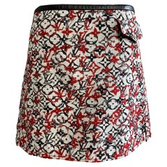 Louis Vuitton skirt logoed in shades of white and red.