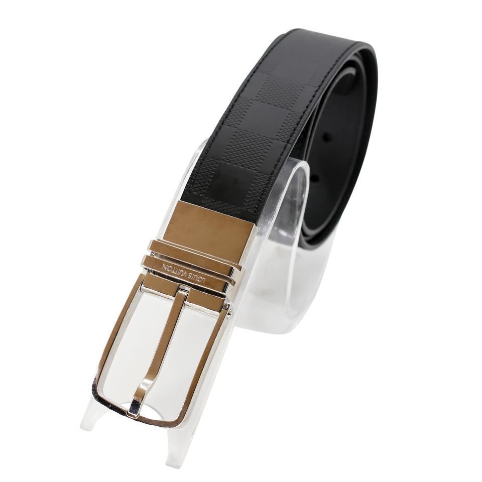 Here is a beautiful Louis Vuitton belt with elegant chrome detail the belt is a reversible style with monogram design. The belt includes a 5 hole adjustment and measures 43 inches long. The belt has been used for weeding and special occasions does