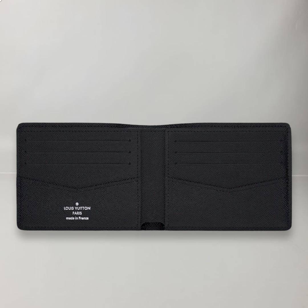 Louis Vuitton Slender Wallet Black Taiga Leather In New Condition For Sale In Nicosia, CY