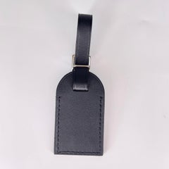 Louis Vuitton Petite étiquette de bagage en cuir de veau noir