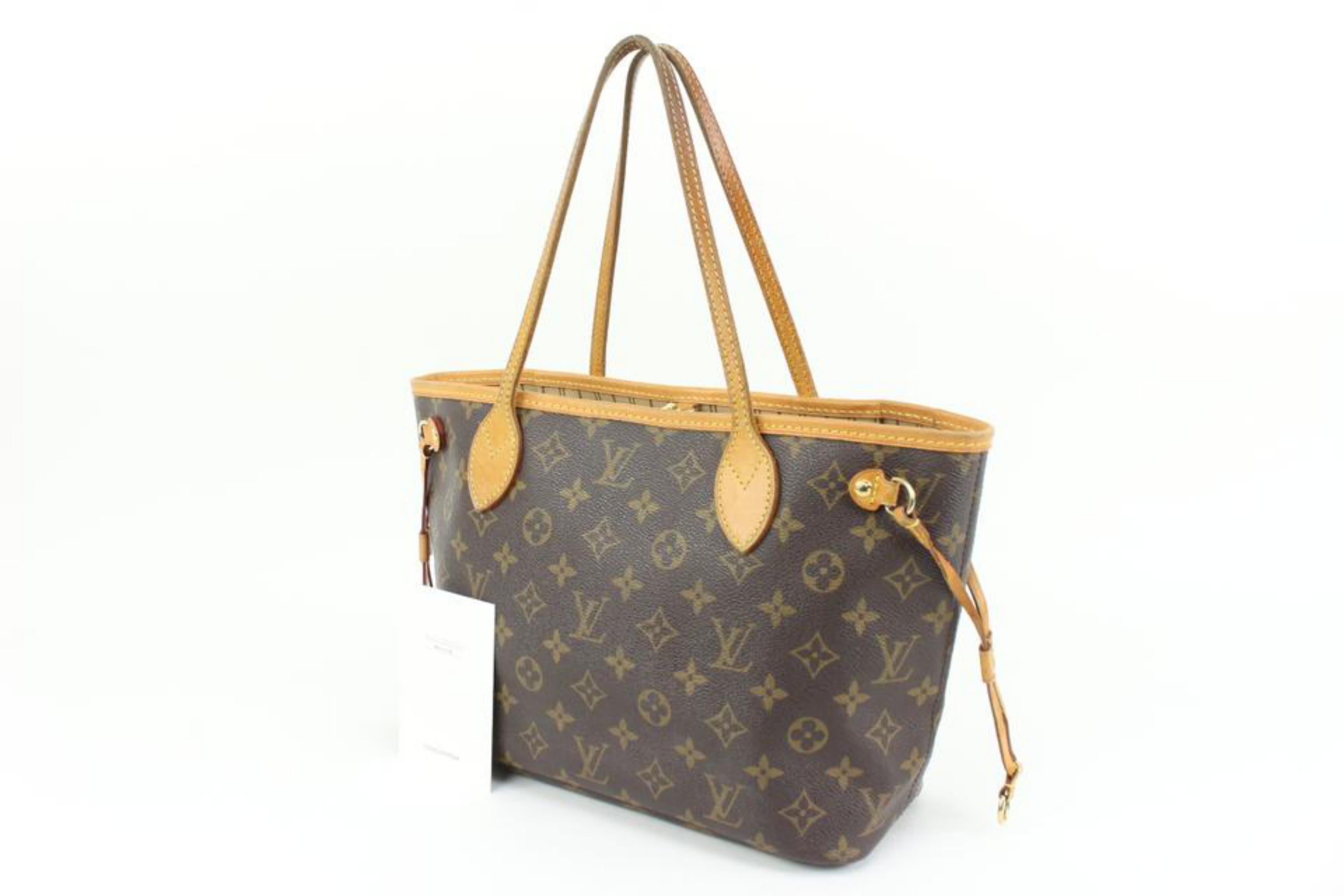 Louis Vuitton Small Monogram Neverfull PM Tote bag 11lk323s
Date Code/Serial Number: VI3007
Made In: France
Measurements: Length:  15
