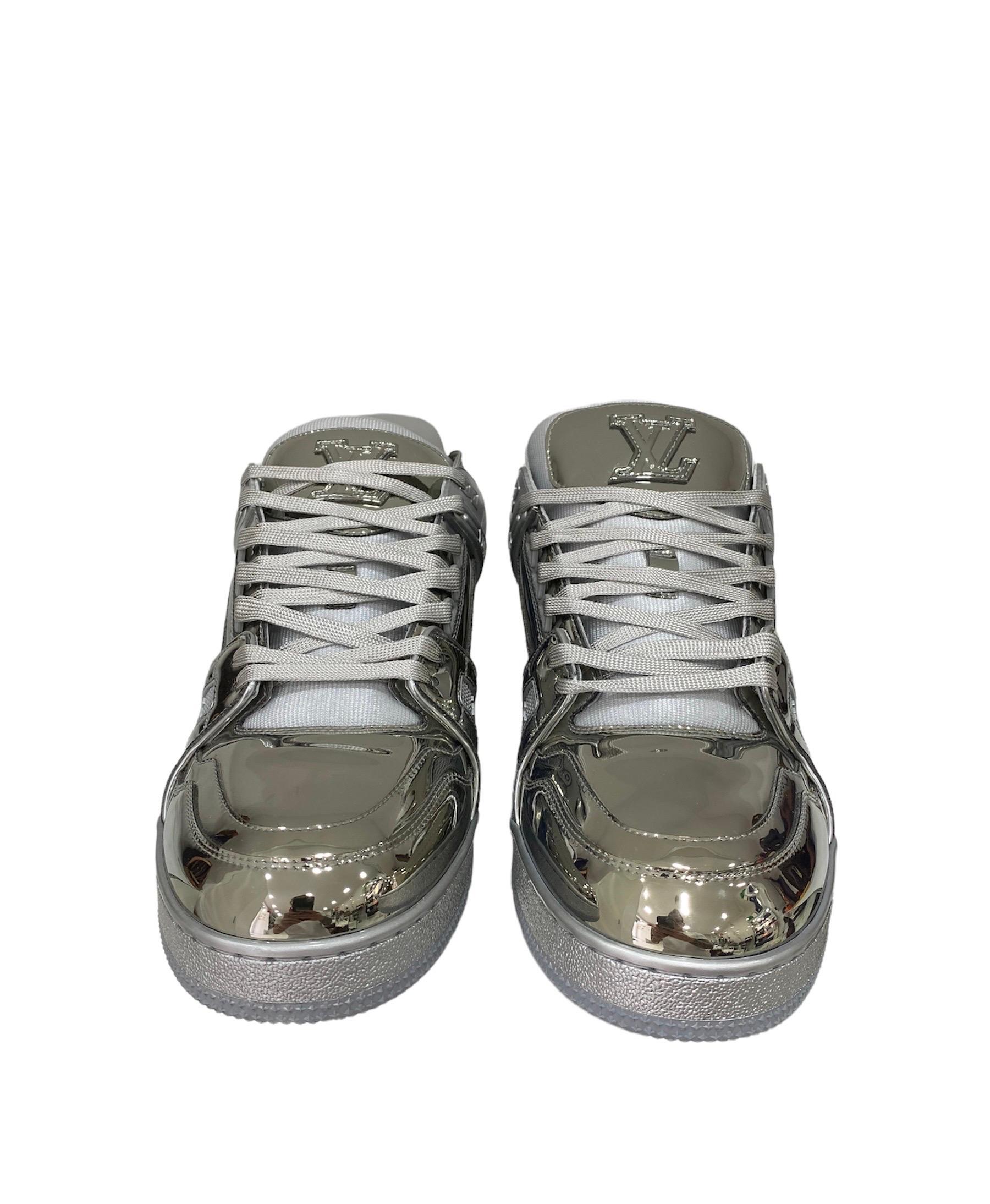 Sneakers for use by Vuitton, Trainer model, made of silver mirror paint number 44 EU. Worn are for testing as you can see from the photos. Complete with box, like new conditions.