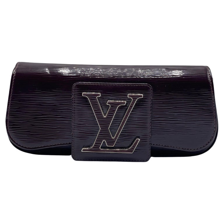 Limited Edition:Brand New/Louis Vuitton Speaker Clutch in brown monogram  canvas For Sale at 1stDibs