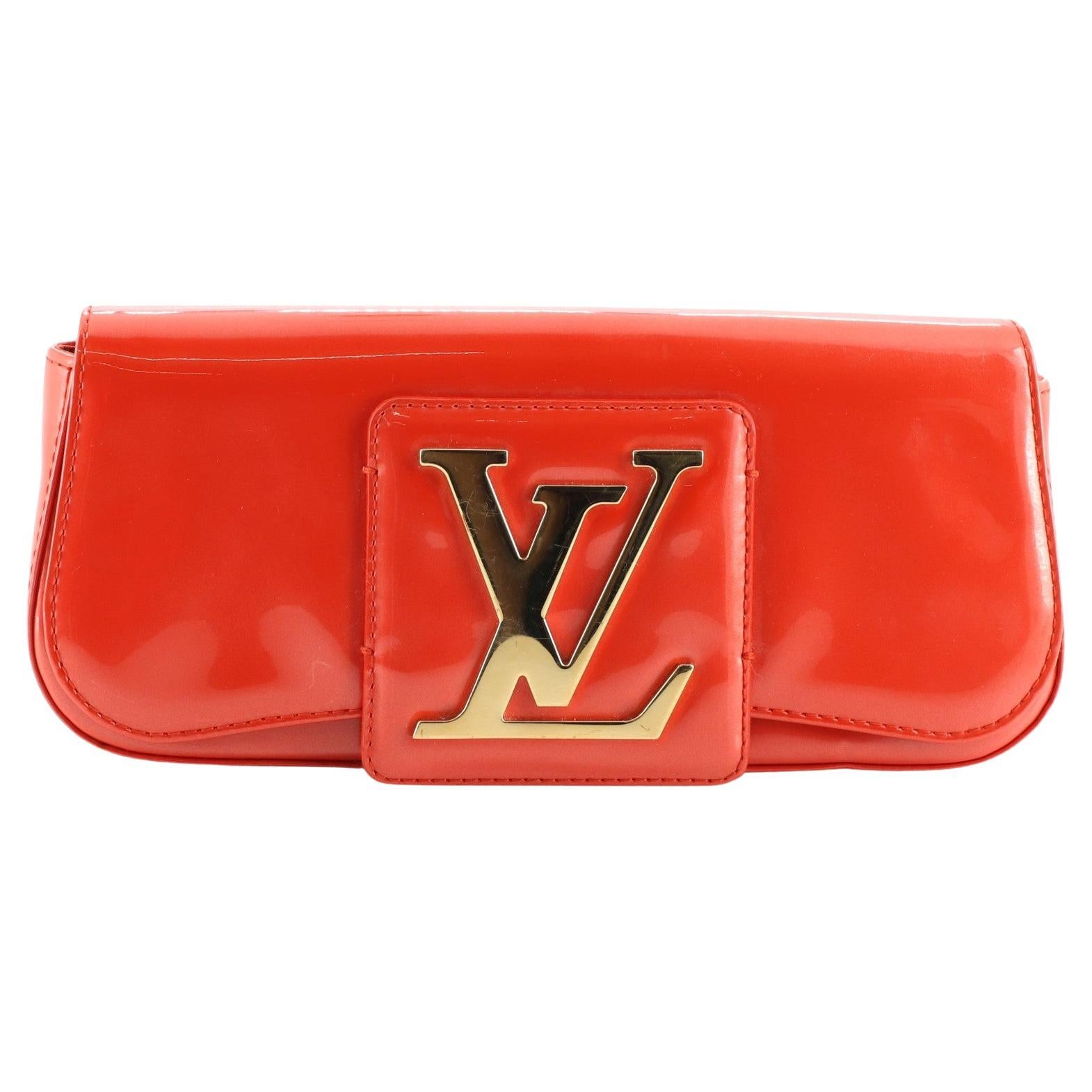 Louis Vuitton Magenta Vernis Leather Louise Clutch at 1stDibs