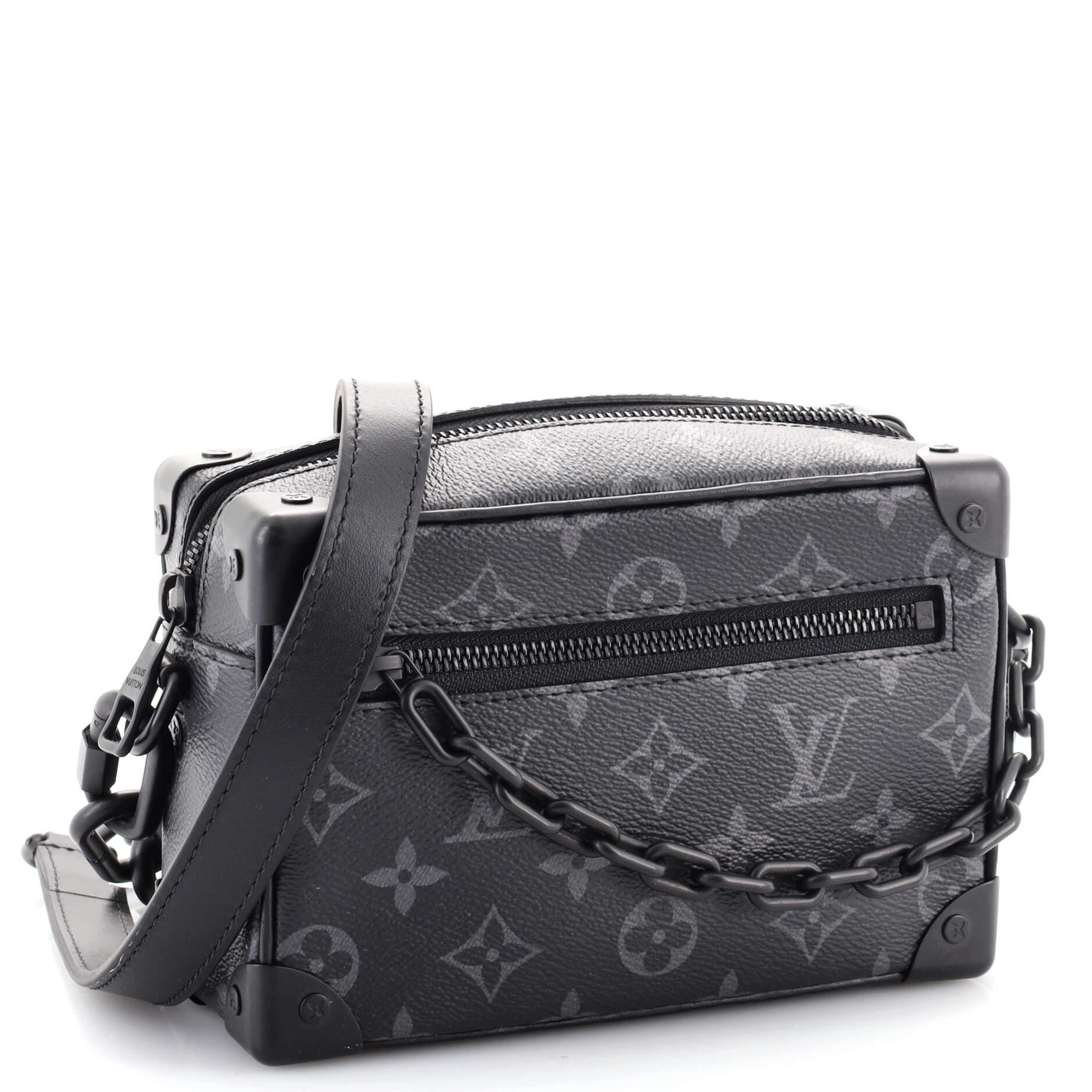 louis vuitton black trunk bag