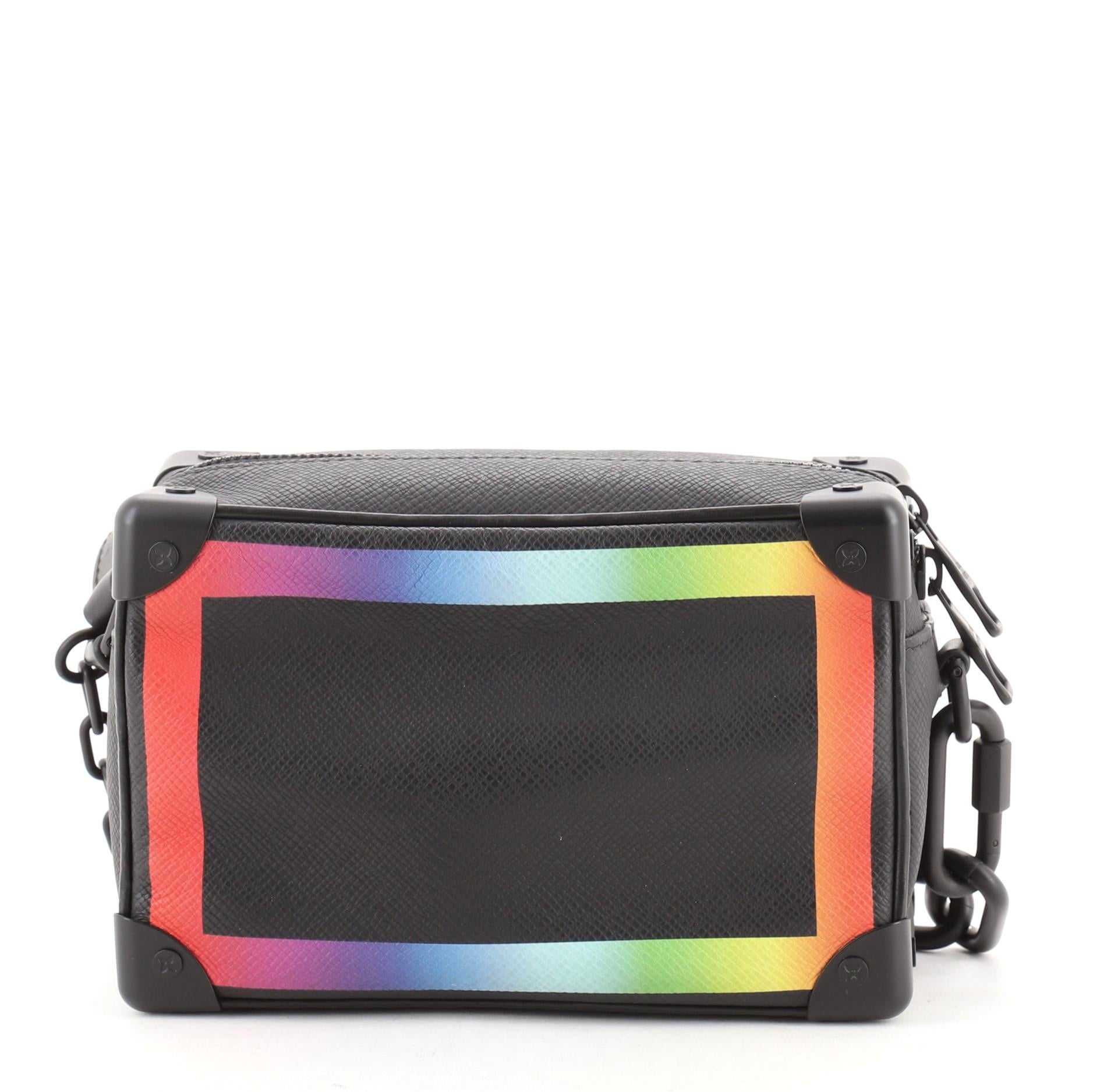 Louis Vuitton Soft Trunk Bag Rainbow Taiga Leather Mini
Black Rainbow Taiga Leather

Condition Details: Creasing on exterior, small indentations on strap, scratches on hardware.

44860MSC

Height 5
