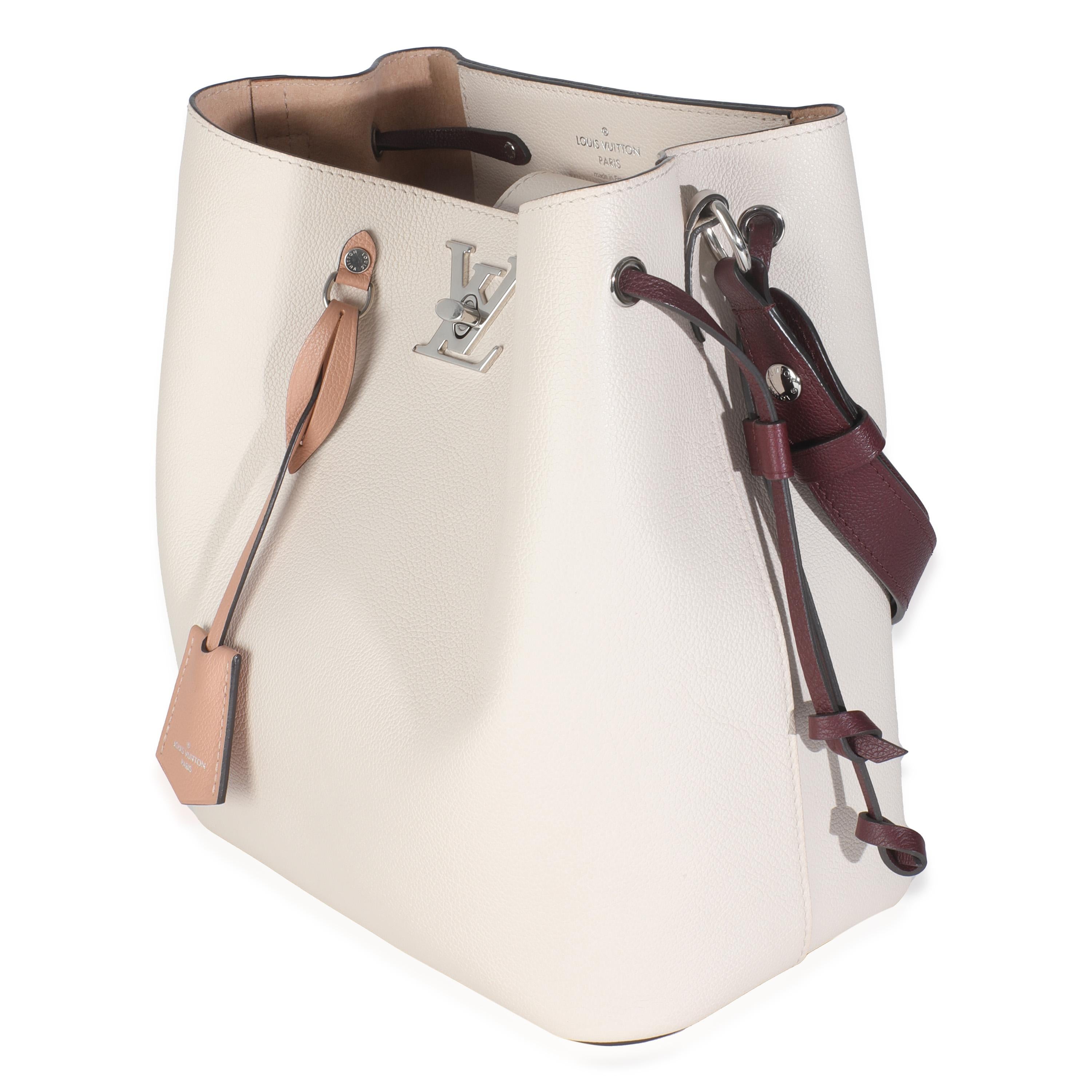 Louis Vuitton Soie Quartz Calla Calfskin Lockme Bucket Bag In Excellent Condition For Sale In New York, NY