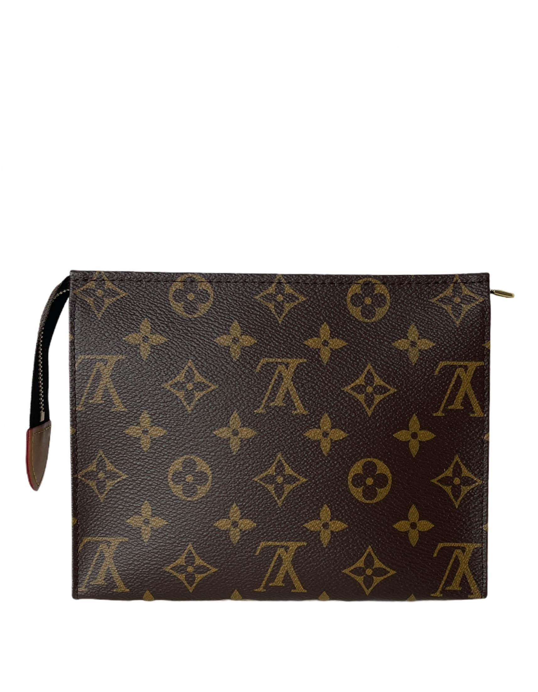 Louis Vuitton SOLD OUT DISCONTINUED Monogram Toiletry Pouch 19

Made In: Spain
Year of Production: 2019
Color: Brown
Hardware: Goldtone brass
Materials: Monogram coated canvas with vachetta leather
Lining: Beige washable textile
Closure/Opening: Zip