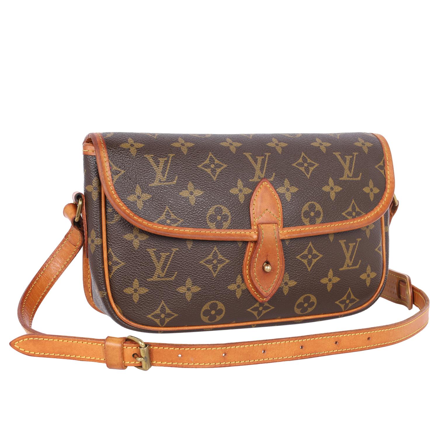 Authentic, pre-owned Louis Vuitton Sologne shoulder cross body bag. This classic brown monogram cross body bag makes a perfect everyday bag. Features monogram canvas, leather accents, front flap closure with buckle, rear slip pocket, large textile