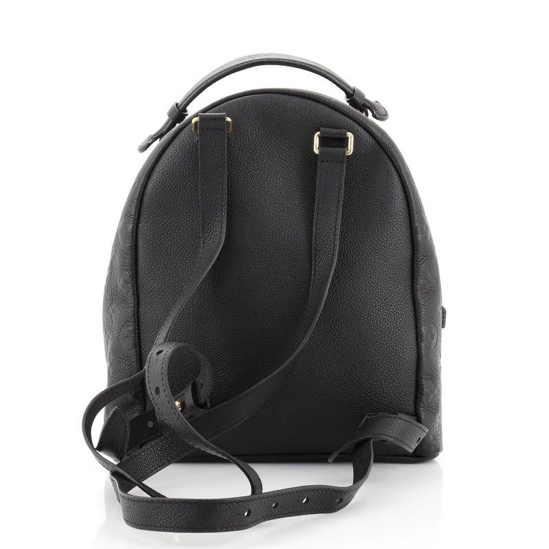 monogram leather backpack