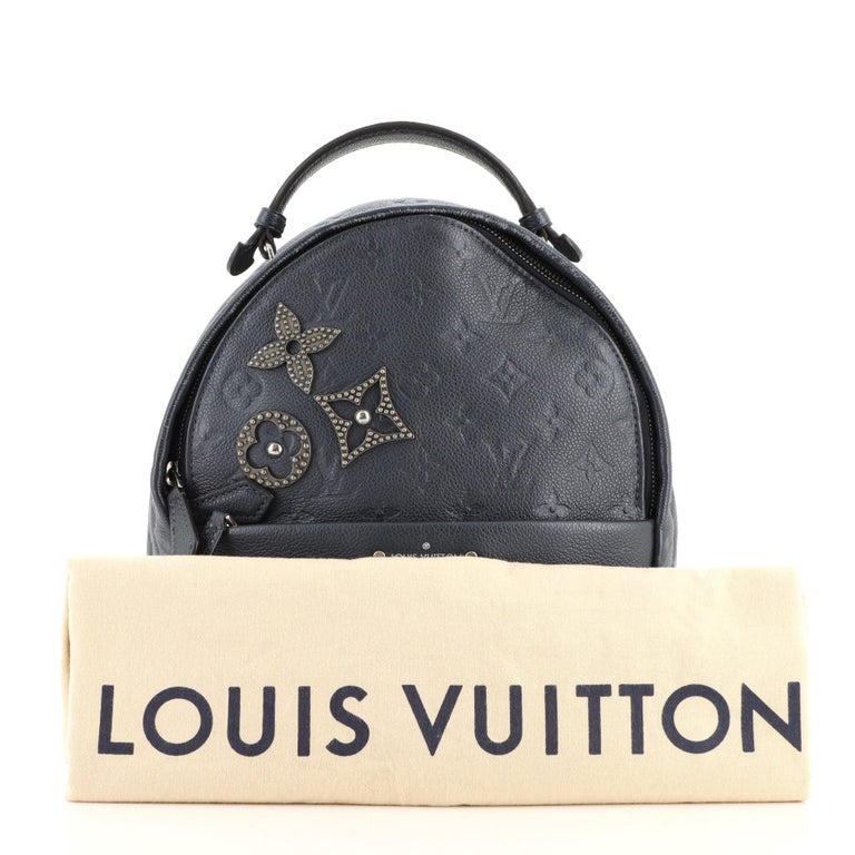 At Auction: Louis Vuitton, Louis Vuitton Sorbonne Backpack