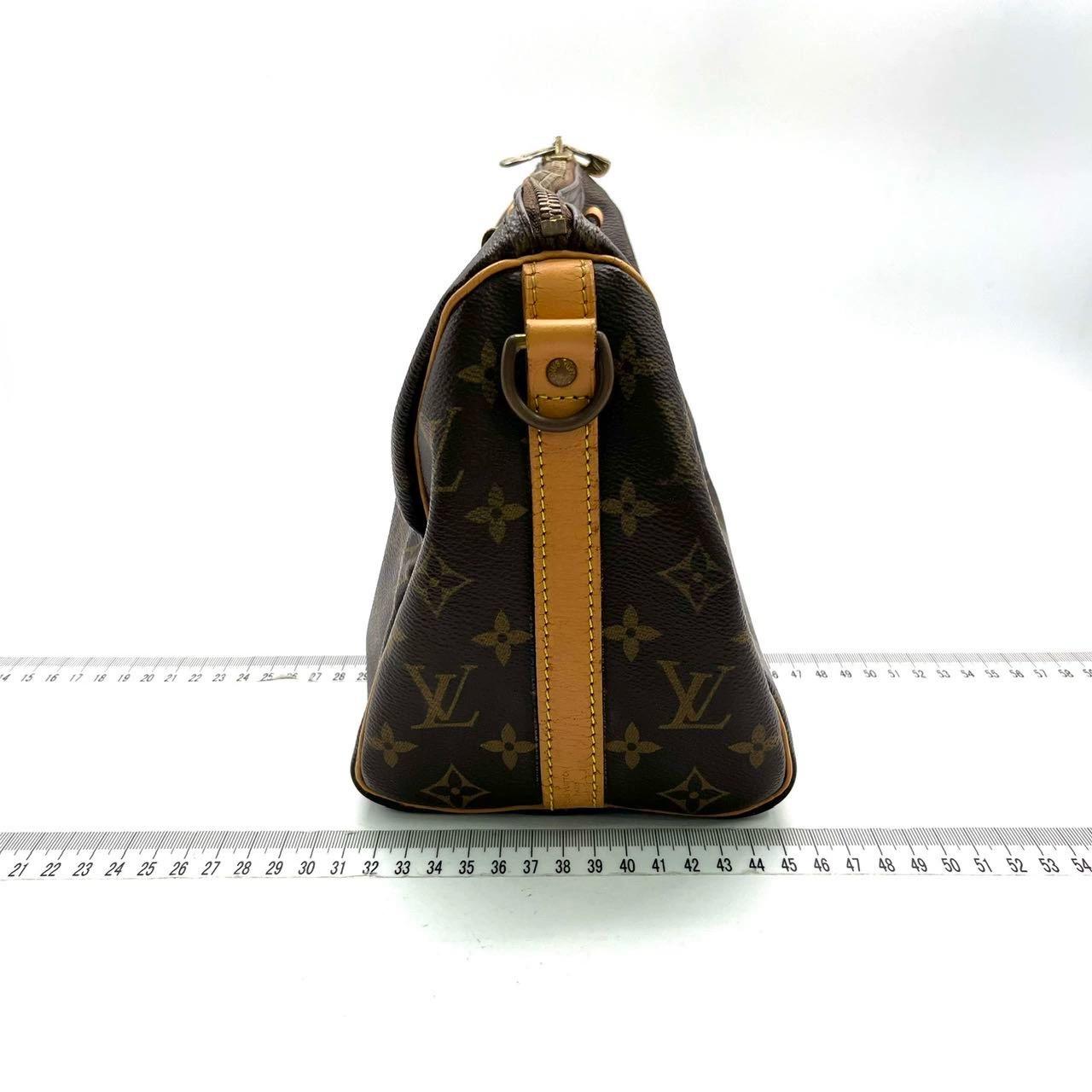 Louis Vuitton Speedy 25 Bandouliere Marrone con Monogram e Cinturino In condizioni discrete in vendita a AUBERVILLIERS, FR