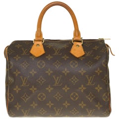 Used Louis Vuitton Speedy 25 handbag in brown monogram canvas, in good condition