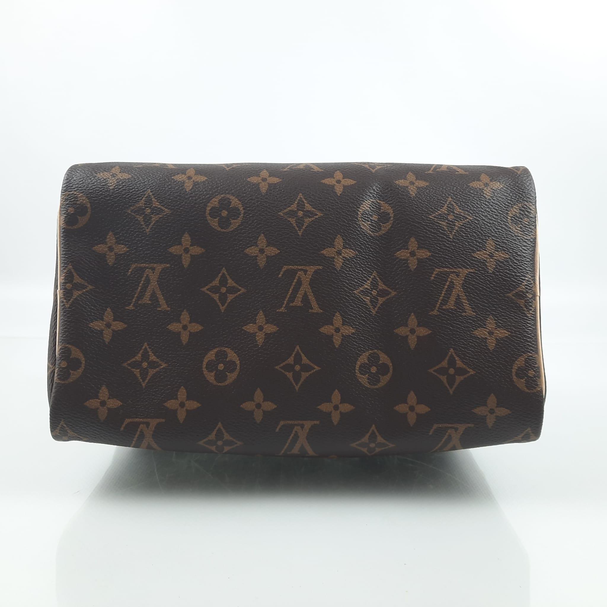 Louis Vuitton Speedy 25 Monogram coated canvas In New Condition For Sale In Nicosia, CY