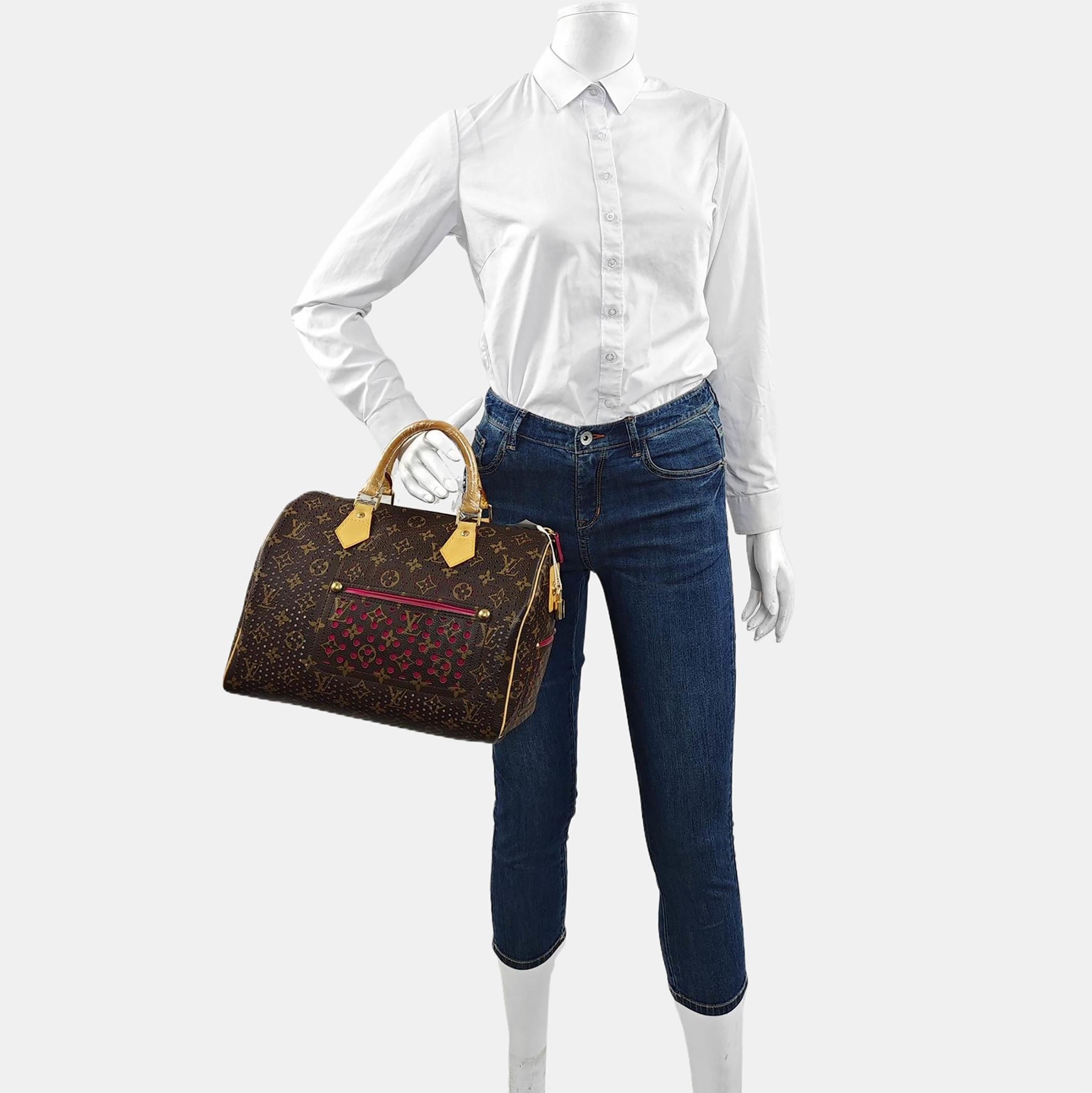 Louis Vuitton Speedy 30 Marrone Traforato Monogram Interno Rosa In condizioni buone in vendita a AUBERVILLIERS, FR
