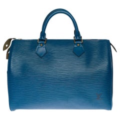 Louis Vuitton Speedy 30 handbag in blue cobalt épi leather and gold hardware
