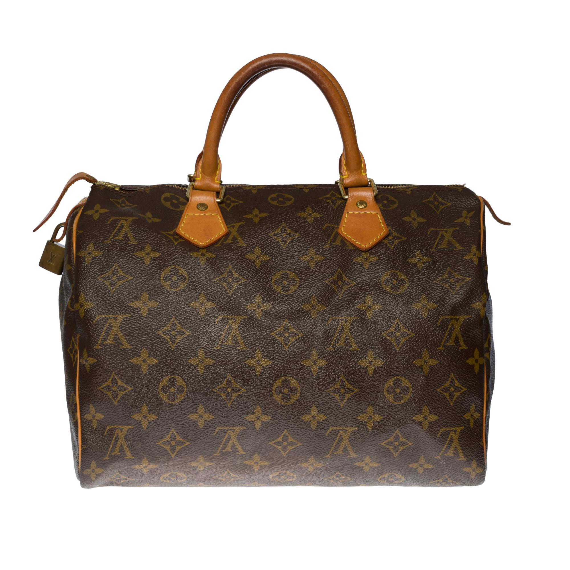 Beautiful Louis Vuitton Speedy 30 handbag in brown Monogram canvas
Gold-tone metal hardware, double leather handle for carrying. Double zip closure
Brown canvas interior
Signature: 