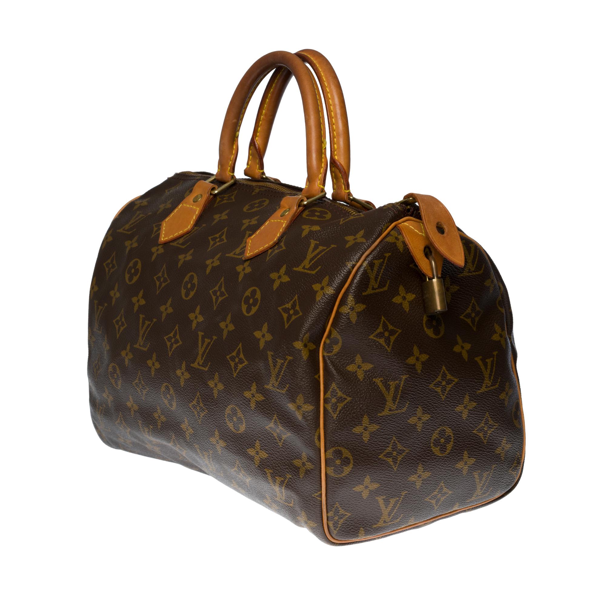 Black Louis Vuitton Speedy 30 handbag in brown canvas
