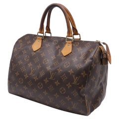 Louis Vuitton Speedy 30 Handbag in Brown Coated Canvas