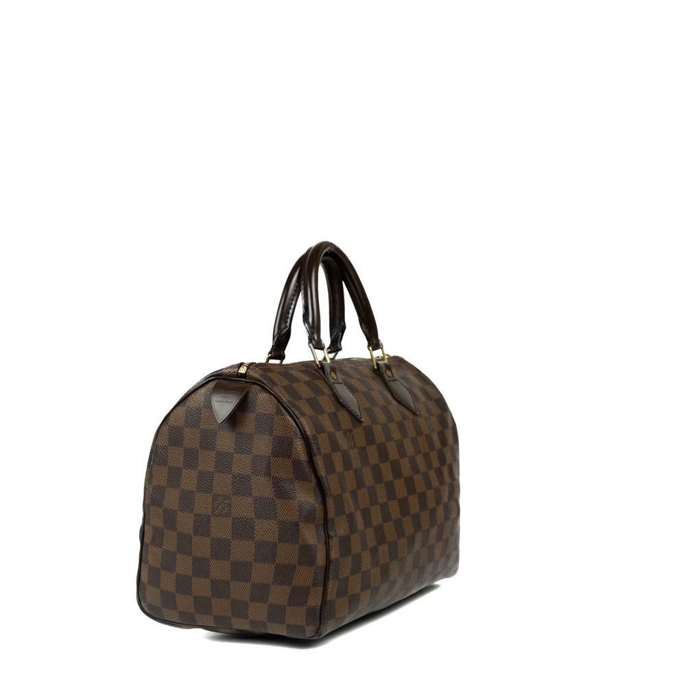 - Designer: LOUIS VUITTON
- Model: Speedy 30
- Condition: Very good condition. Minor sign of wear on base corners, Interior stains, Minor Discoloration of the hardware
- Accessories: Original Dustbag, Padlock, Keys
- Measurements: Width: 30cm,