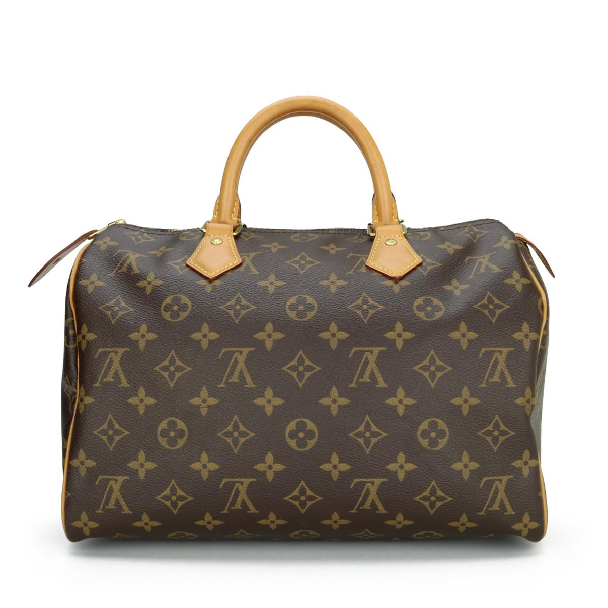 Louis Vuitton Speedy 30 in Monogram 2015.

This bag is in very good condition. 

- Exterior Condition: Very good condition. Light storage creasing to the canvas. Light leather surface rubbing to four base corners. General leather wear and marks