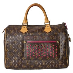 Louis Vuitton Speedy 30 Monogramme perforé Fuchsia