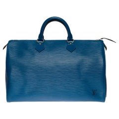 Used Louis Vuitton Speedy 35 handbag in blue épi leather, GHW