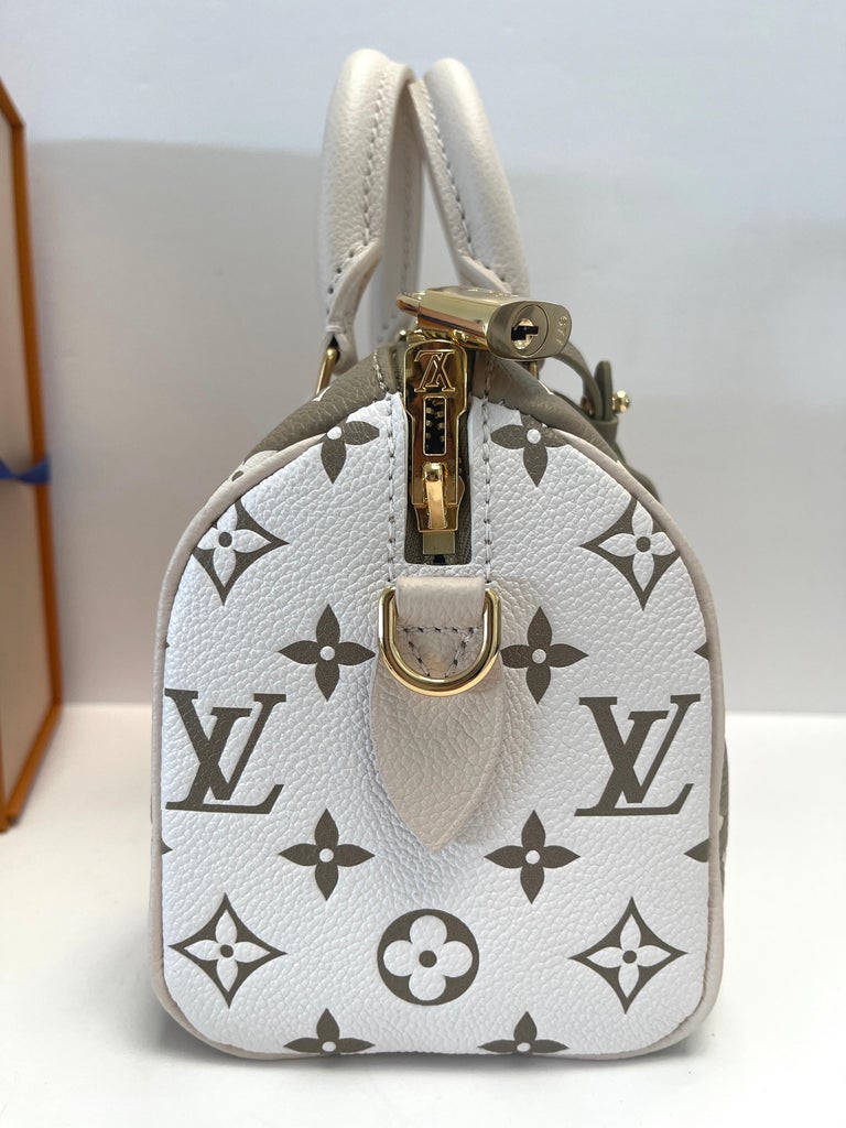 Louis Vuitton 
Soldout Immediately
Speedy in size 20
Fabulous for summer

Gold Hardware
Specs
8.1 x 5.3 x 4.7 inches
 Monogram Empreinte leather 
Printed and embossed grained cowhide leather
Grained leather trim
Microfiber lining
Gold tone