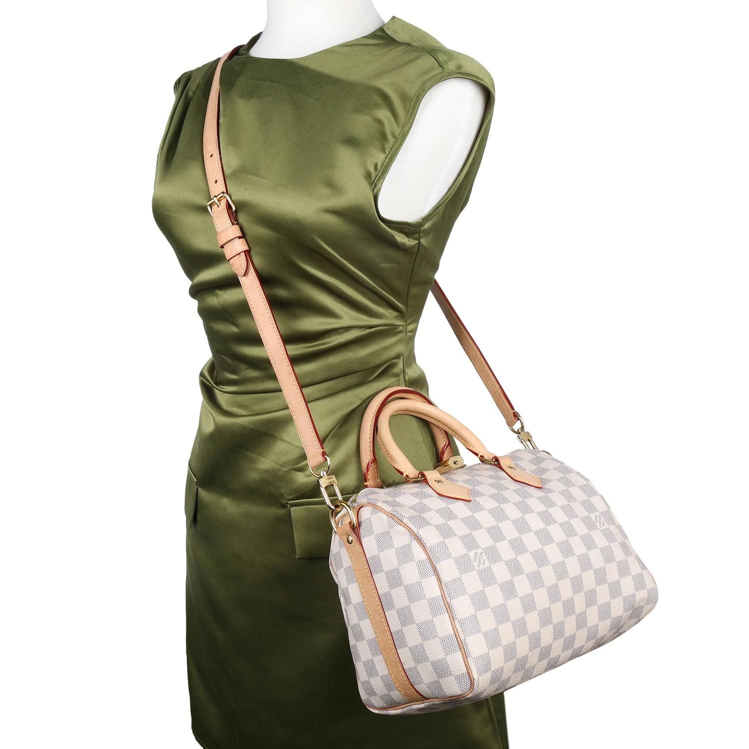 Authentic Louis Vuitton Speedy Bandouliere 25 in damier azur.

Features: Damier Azur Canvas with Leather trim, tan interior lining with zipper patch pocket, double handles, and zip top closure. Includes padlock and key.

Made in France 

Strap Drop: