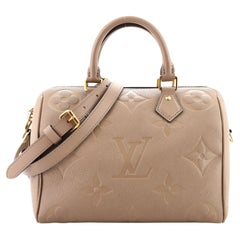 Louis Vuitton SPEEDY BANDOULIÈRE Monogram Empreinte leather 20 Bag M46118  Kaki at 1stDibs