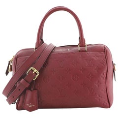 Louis Vuitton Sac à main Speedy à bandoulière NM Monogram Empreinte en cuir 25