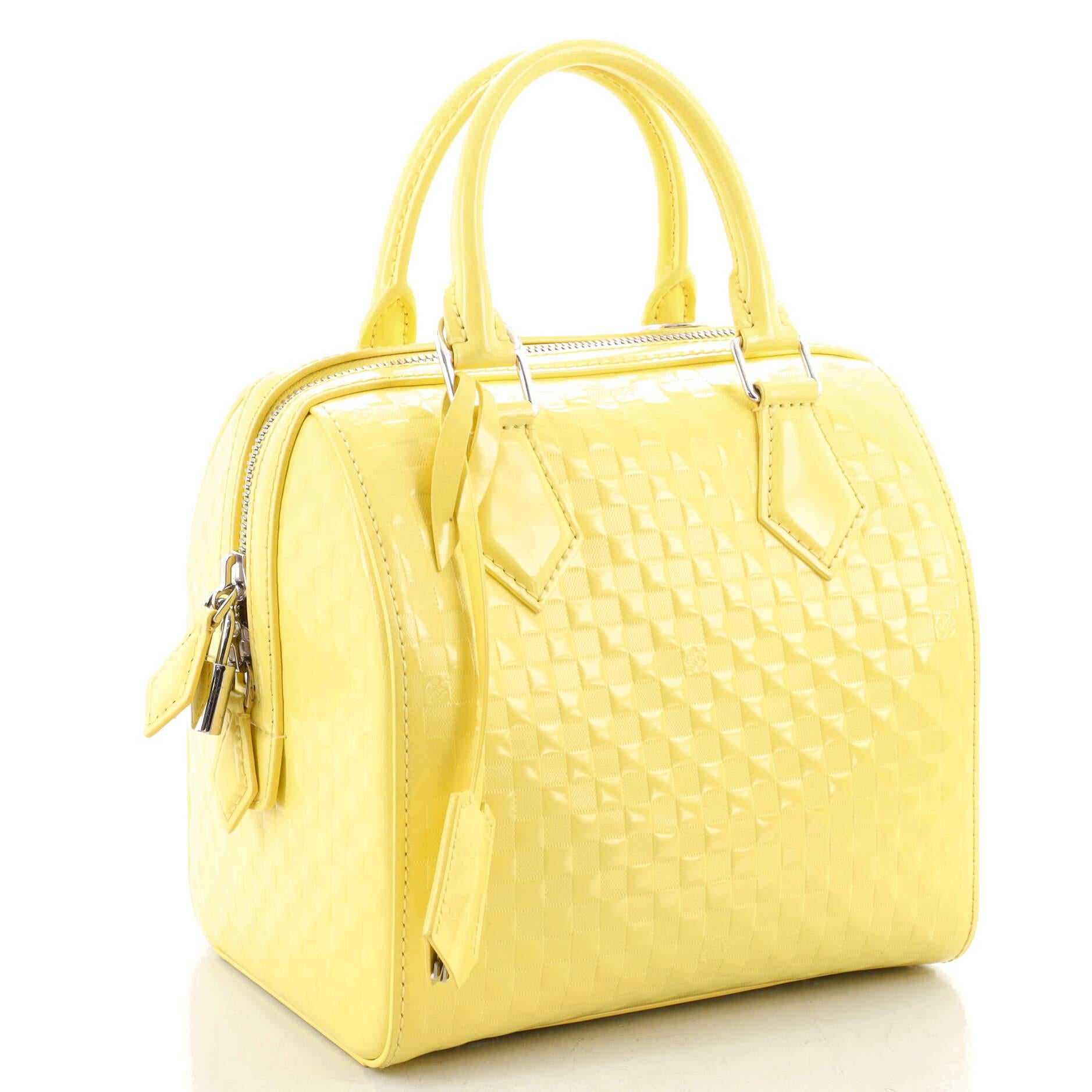 louis vuitton cube bag
