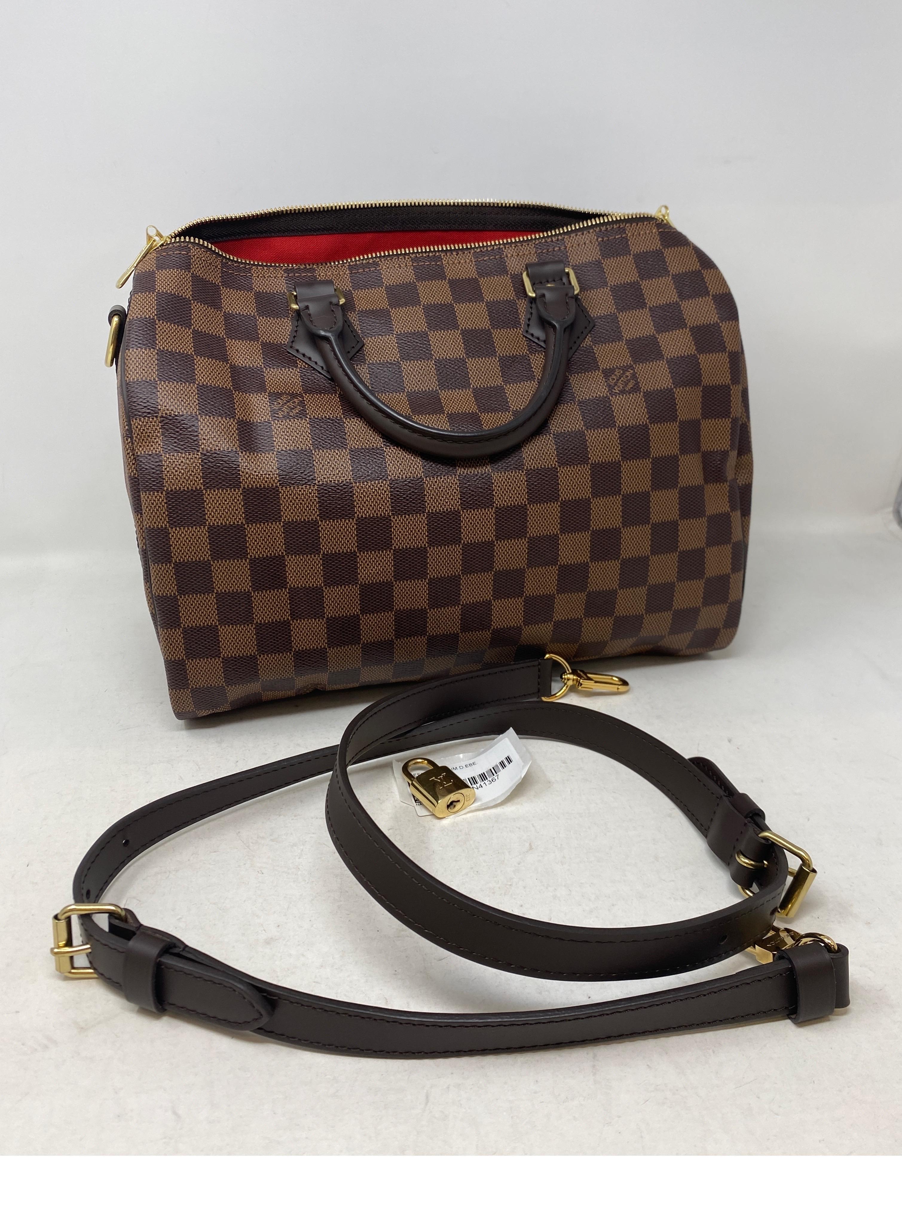 Louis Vuitton Speedy 30 Bandouliere. Damier ebene Speedy 30 with strap. Brand new condition. Never used. Classic speedy with detachable strap. Can be shortened or worn longer. Includes lock, keys, strap, and dust bags. Guaranteed authentic. 