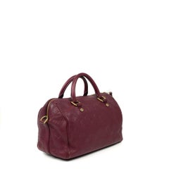 LOUIS VUITTON, Speedy Empreinte in burgundy leather