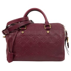 LOUIS VUITTON, Speedy Empreinte in burgundy leather