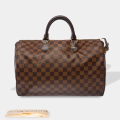 LOUIS VUITTON Speedy Handbag Brown