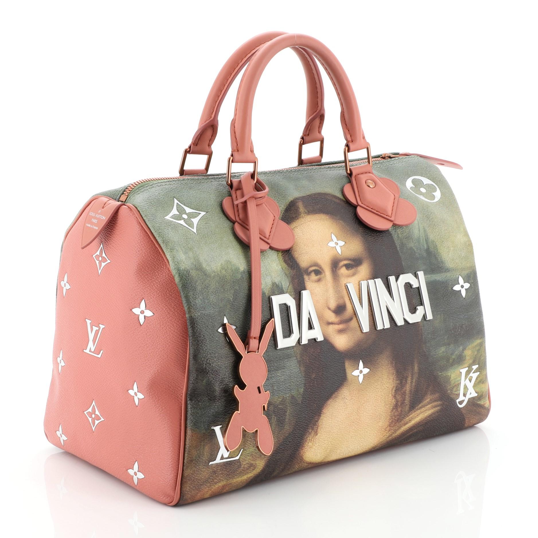 This Louis Vuitton Speedy Handbag Limited Edition Jeff Koons Da Vinci Print Canvas 30, crafted from pink coated canvas exterior with Da Vinci print, features dual rolled leather handles, reflective metallic letters and trimmings, and gold-tone