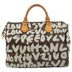 LOUIS VUITTON, Speedy in brown monogram canvas LOUIS VUITTON, Speedy in brown monogram canvas
