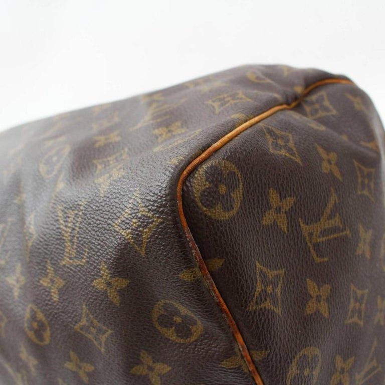 Louis Vuitton Speedy Large Monogram 35 869266 Brown Coated Canvas Satchel For Sale at 1stdibs