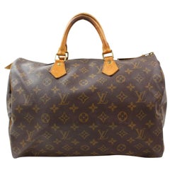Louis Vuitton Speedy Large Monogram 35 869266 Brown Coated Canvas Satchel