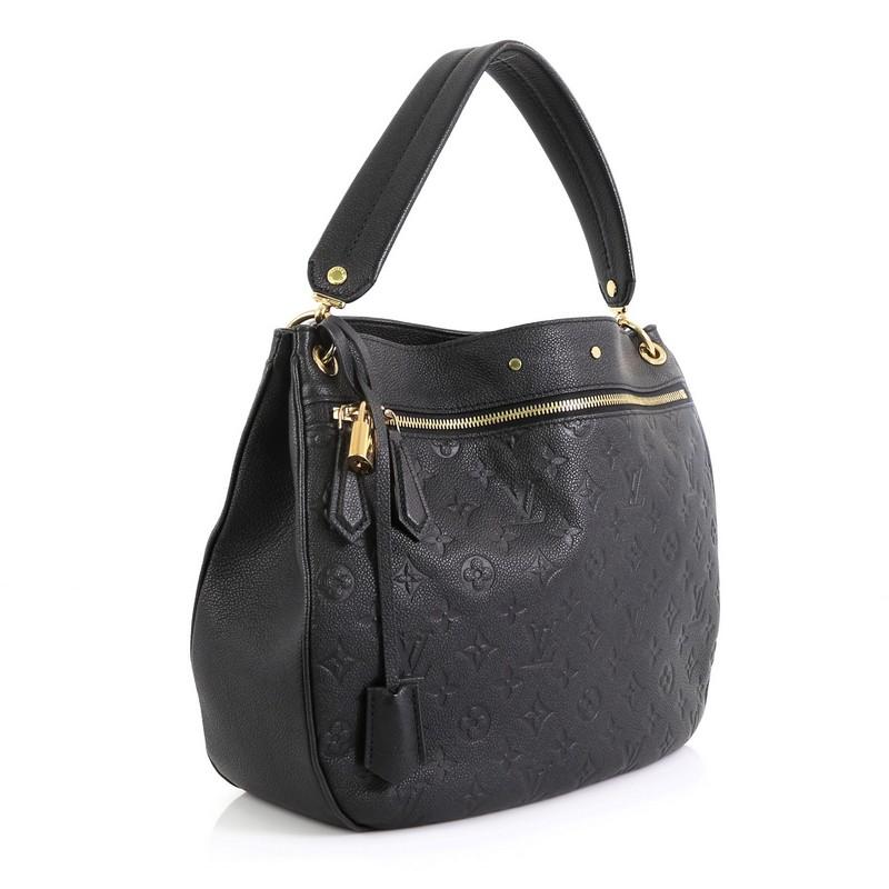 This Louis Vuitton Spontini NM Handbag Monogram Empreinte Leather, crafted from black monogram empreinte leather, features a flat leather strap, exterior front zip pocket, protective base studs, and gold-tone hardware. It opens to a gray fabric