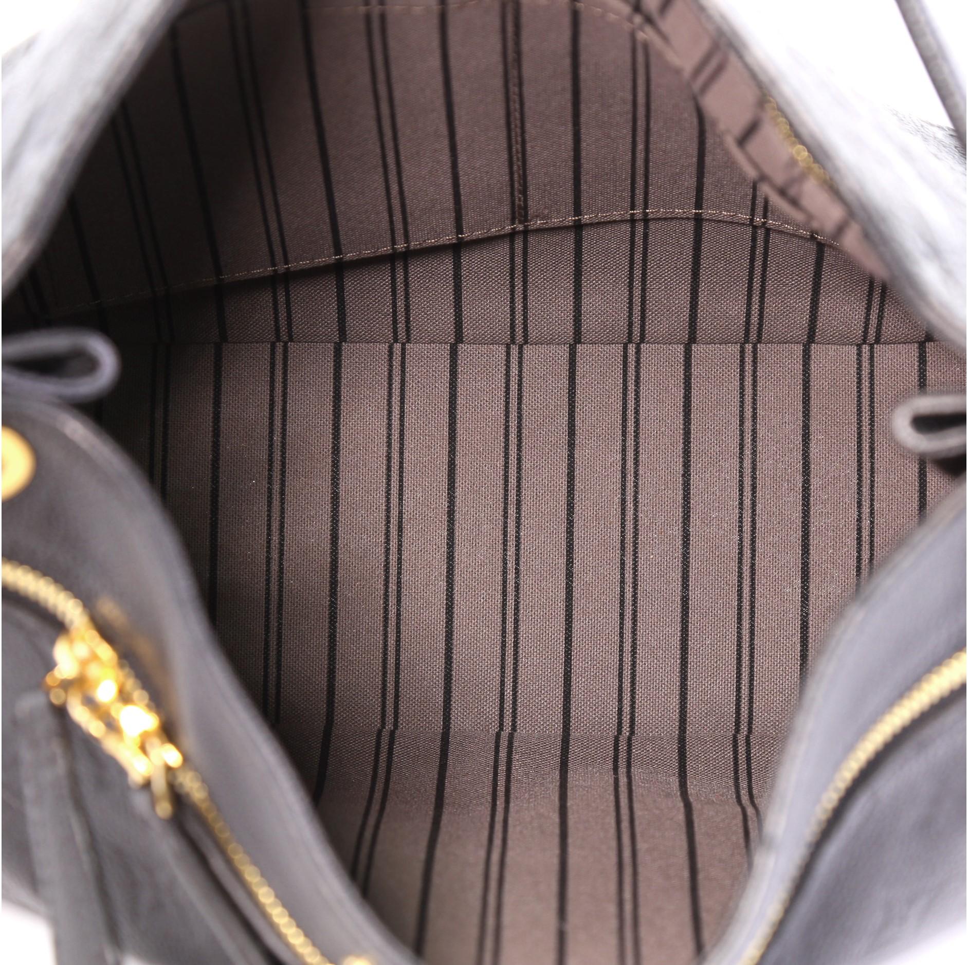 Louis Vuitton Spontini NM Handbag Monogram Empreinte Leather In Excellent Condition In NY, NY