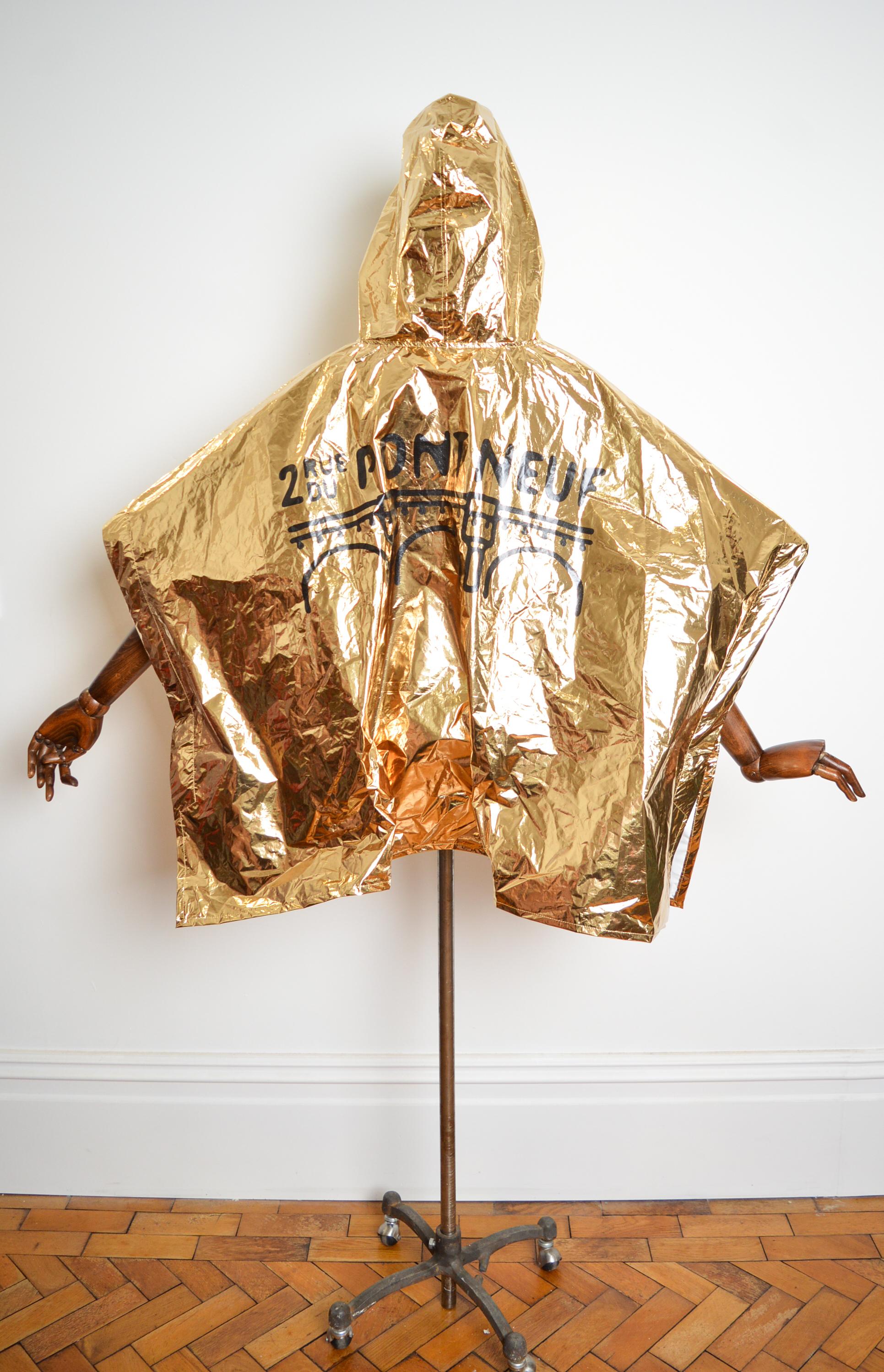 LOUIS VUITTON Spring Summer 2024 Show Invitation - Gold Souvenir Festival Poncho For Sale 5